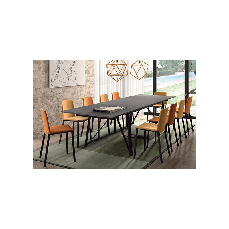 CHAISE MODERNE GARNIE SIMILICUIR ET PIEDS MÉTAL PRIMERA